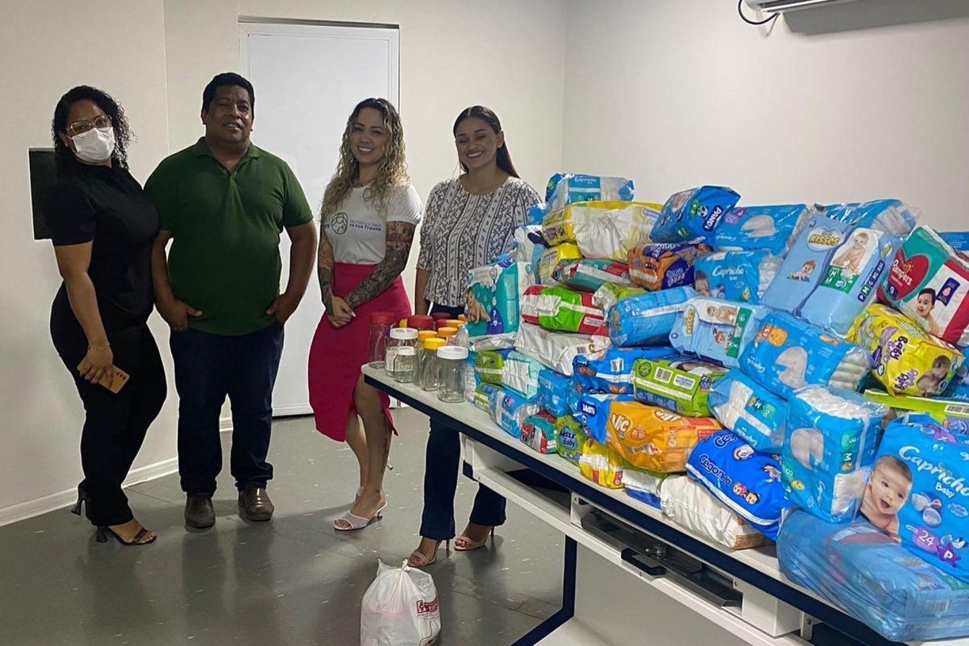 Grupo Madre Tereza realiza doação de fraldas ao Centro de Especialidades Papeléo Paes durante a Campanha Agosto Dourado
